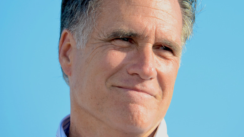 Mitt Romney poses