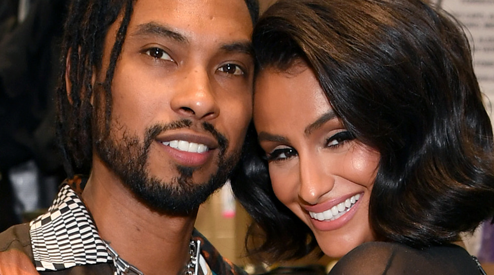 Miguel and Nazanin Mandi smiling cheek to cheek 