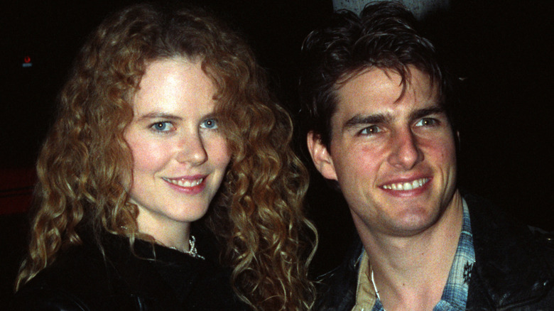 Nicole Kidman and Tom Cruise pose for photographers