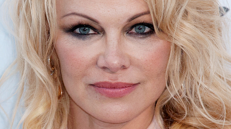 Pamela Anderson looking at camera with slight smile