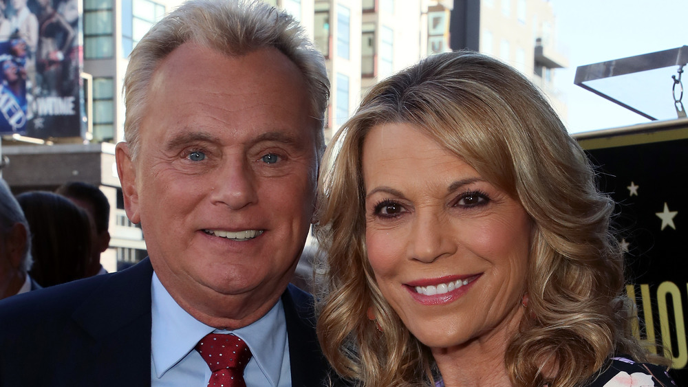 Pat Sajak and Vanna White pose together 