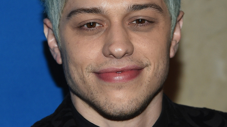 Pete Davidson smiles