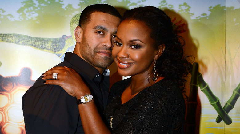 Apollo Nida cuddling Phaedra Parks