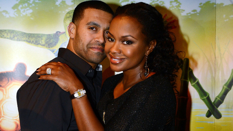 Apollo Nida cuddling Phaedra Parks