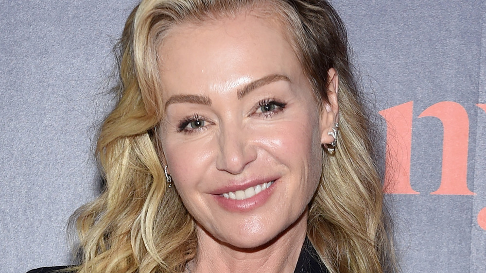 Portia de Rossi posing at an event