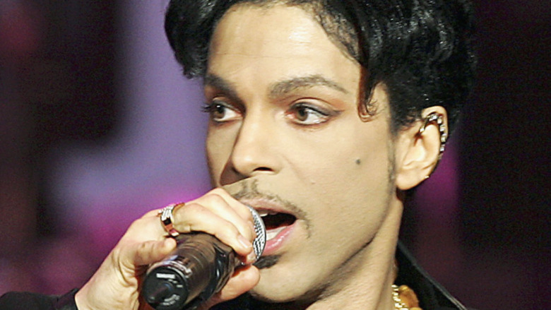 Prince performs onstage in 2005