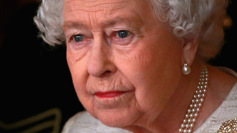 Queen Elizabeth looking sad