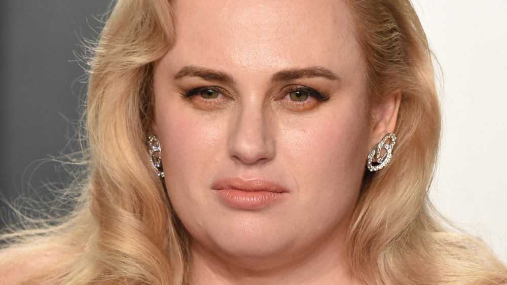 Rebel Wilson staring with a neutral expression