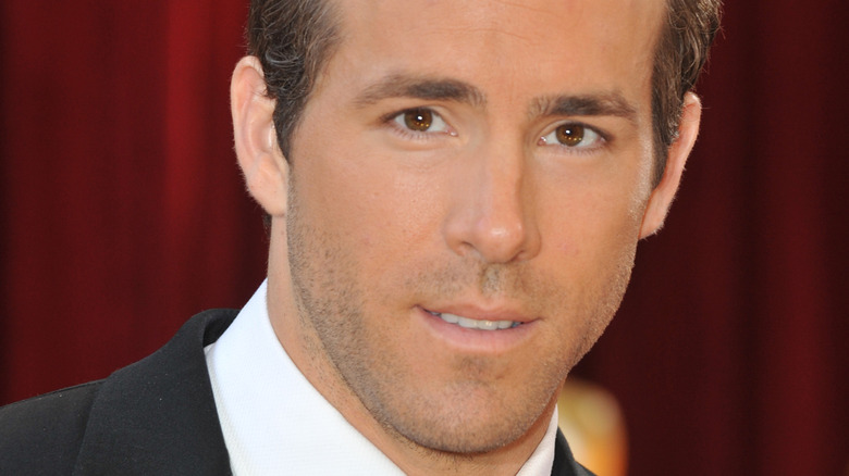 Ryan Reynolds looks serious in black tie