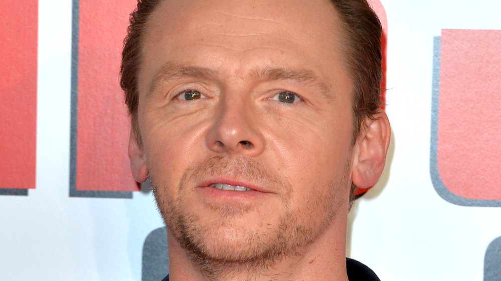 Simon Pegg with a serious expression