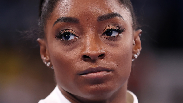 Simone Biles looking away