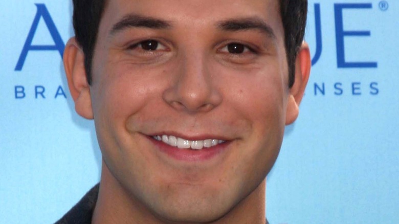 Skylar Astin smiling