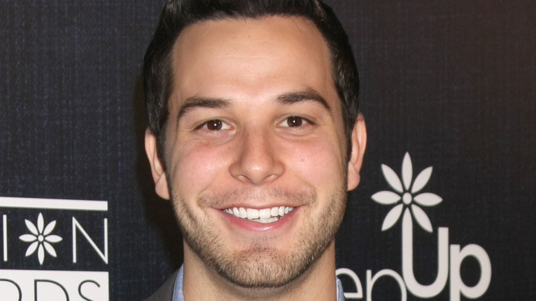 Skylar Astin smiling