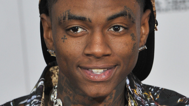 Soulja Boy smiling at an event