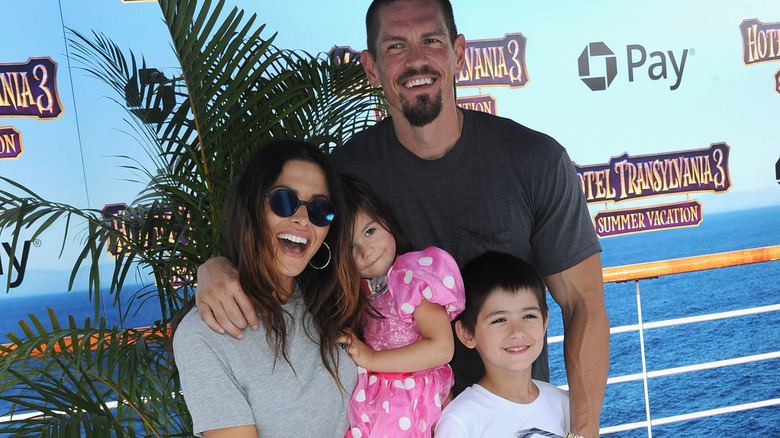 Steve Howey and Sarah Shahi with their kids 