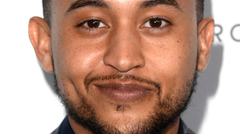 Tahj Mowry smiling