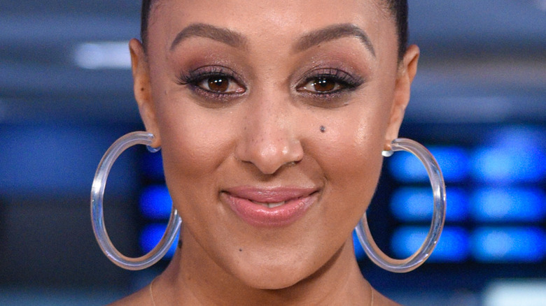 Tamera Mowry smiling