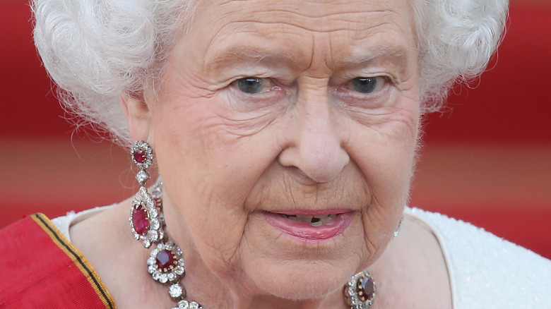 The queen with a neutral expression