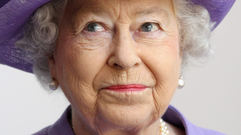 Queen Elizabeth purple hat