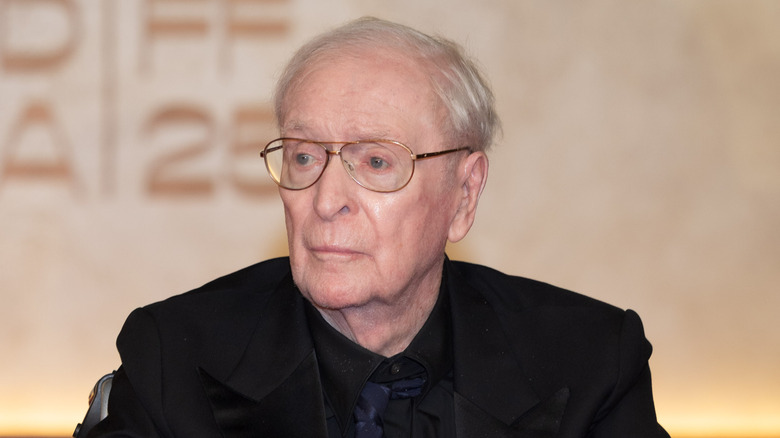 Michael Caine wearing glasses