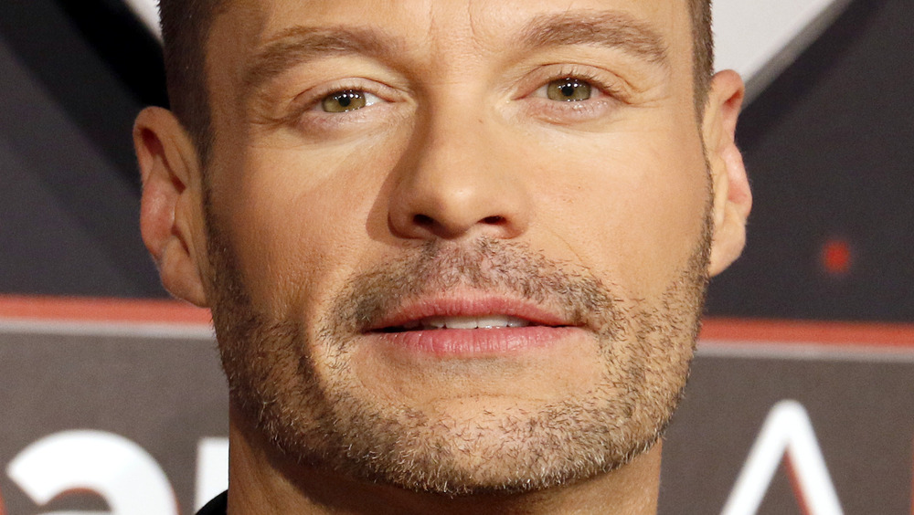 Ryan Seacrest posing