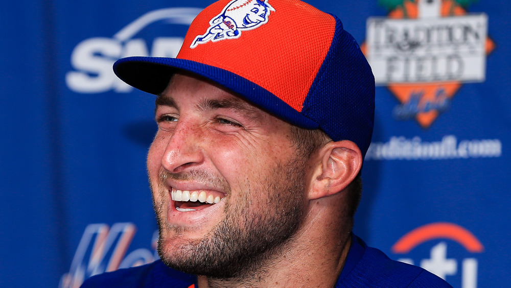 Tim Tebow laughing