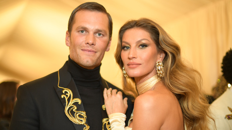 Tom Brady and Gisele Bundchen posing