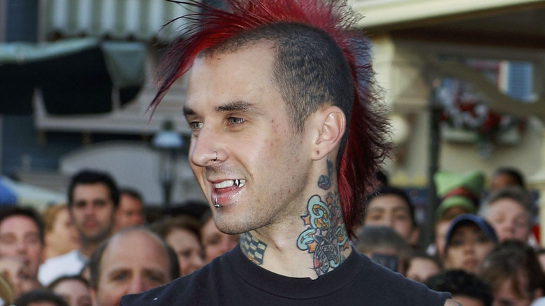Travis Barker with a red mohawk