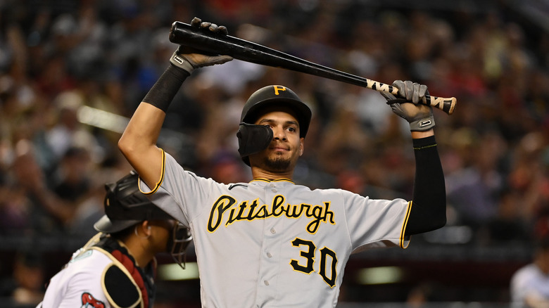 Tucupita Marcano holding baseball bat