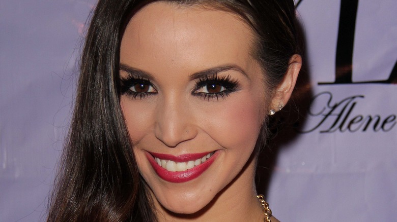 Scheana Marie smiles with side part