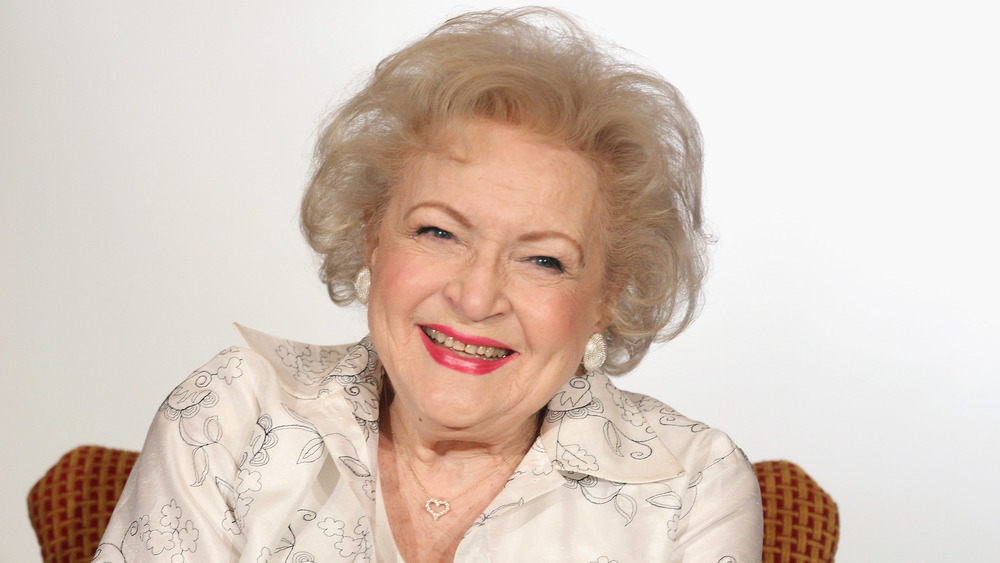 Betty White smiling at the camera for a photocall