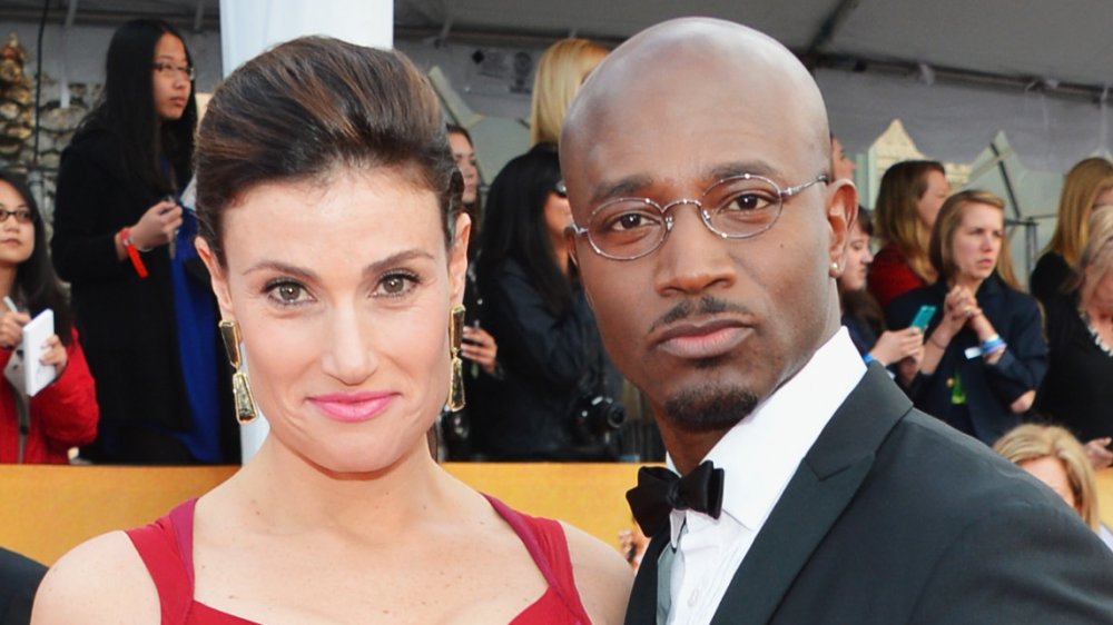 Idina Menzel and Taye Diggs on a red carpet