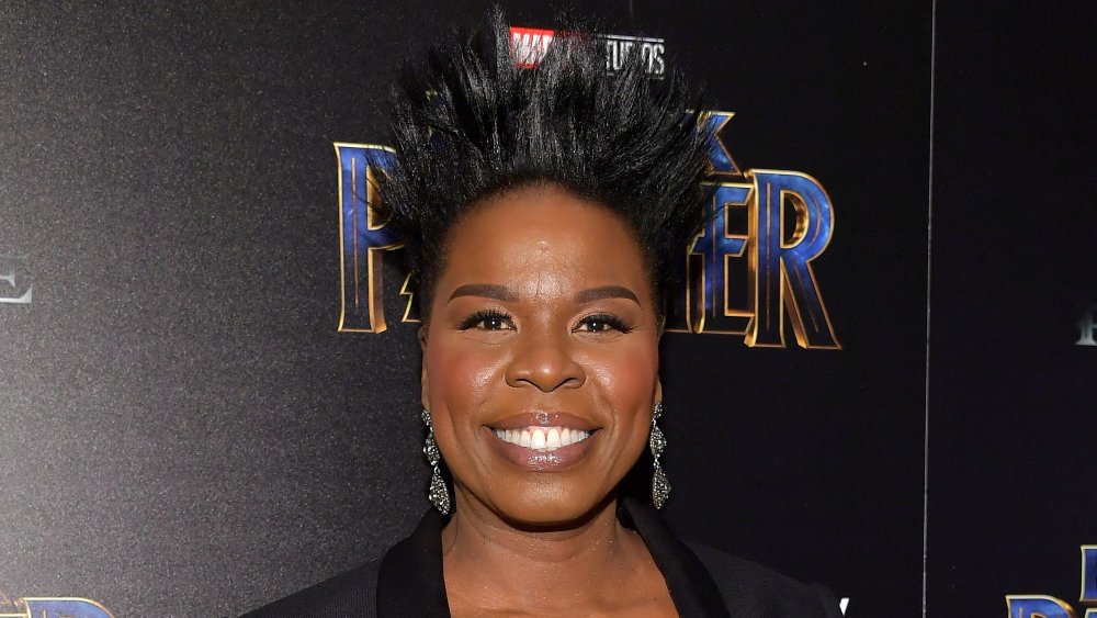 Leslie Jones smiling and posing on the red carpet