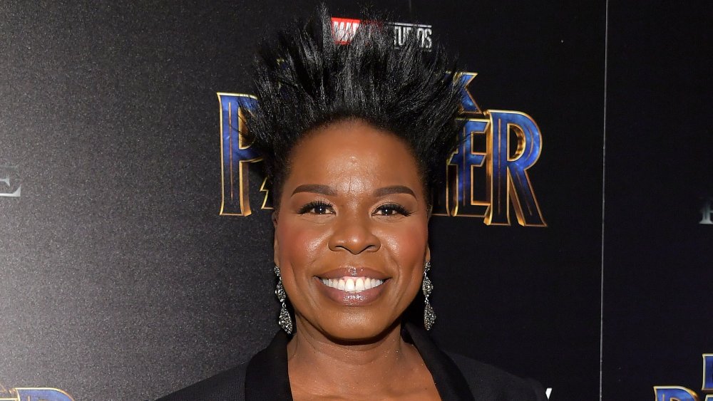 Leslie Jones smiling and posing on the red carpet