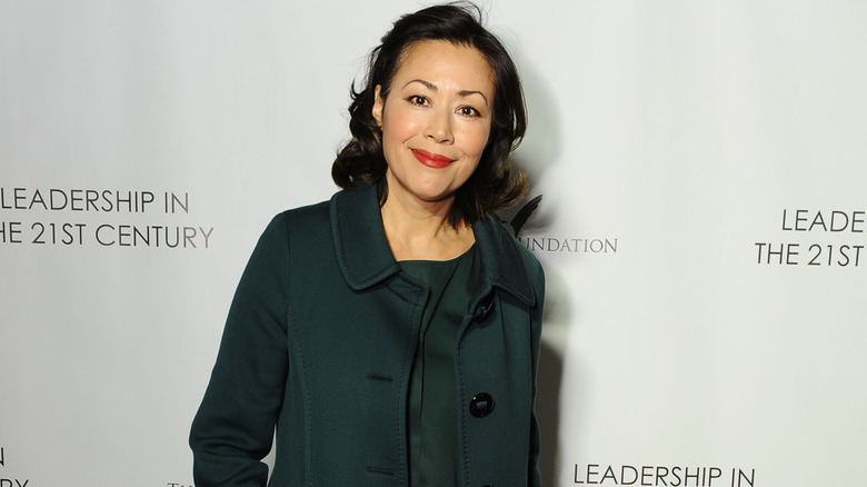 Ann Curry smiling and posing
