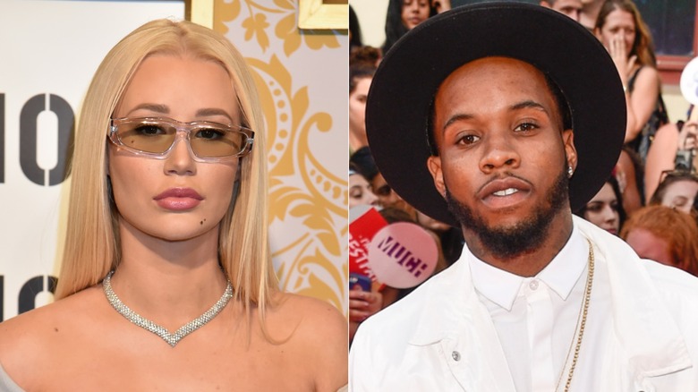 A split image of Iggy Azalea looking into the camera while wearing a set of sunglasses and a sparkly necklace, and Tory Lanez looking at the camera as he sports an all-white outfit and a black hat.