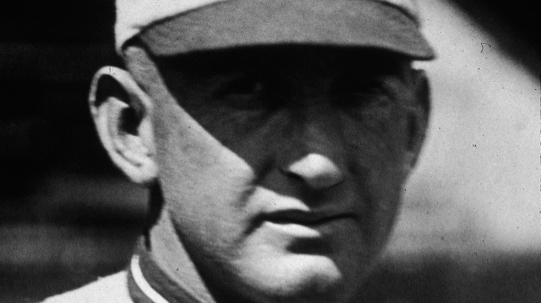 Shoeless Joe Jackson posing