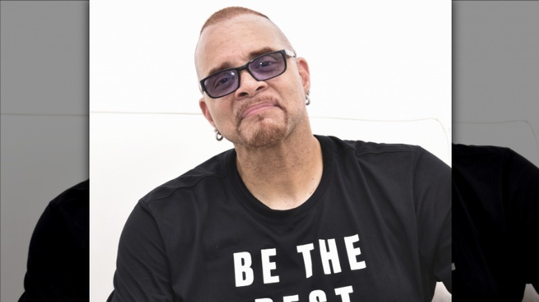 Sinbad wearing tinted sunglasses
