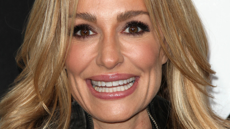 Taylor Armstrong smiles