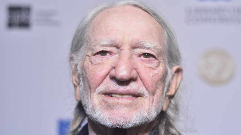 Willie Nelson posing