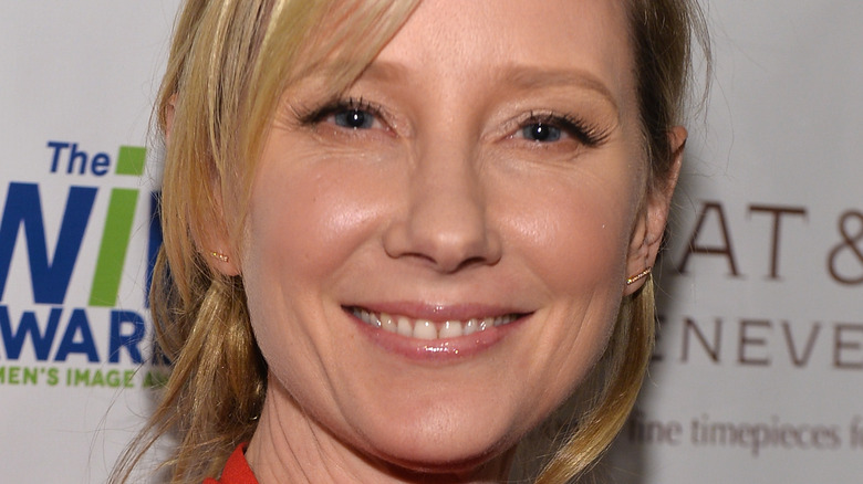 Anne Heche poses for a photograph at an event