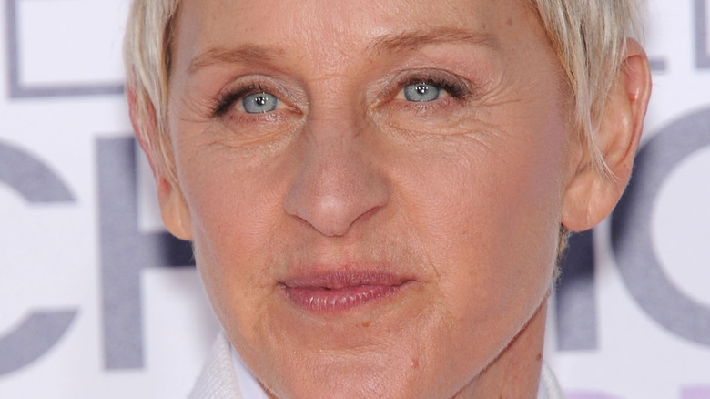 Ellen DeGeneres with a neutral expression