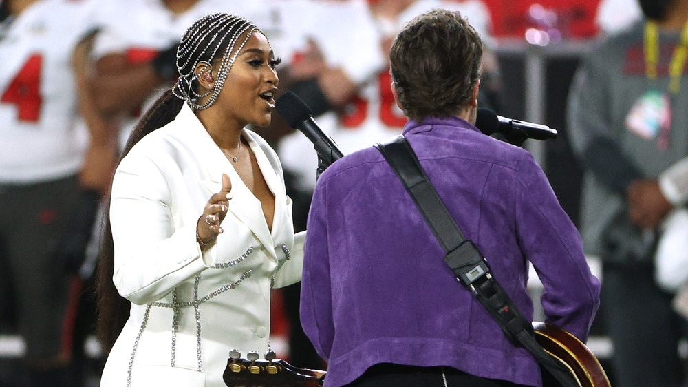 Jazmine Sullivan and Eric Church perform at the Super Bowl LV pregame