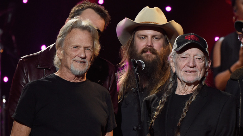 Kris Kristofferson, Chris Stapleton, and Willie Nelson on stage