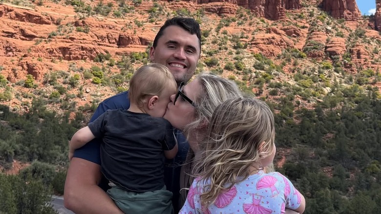 Erika and Charlie Kirk pose with their children