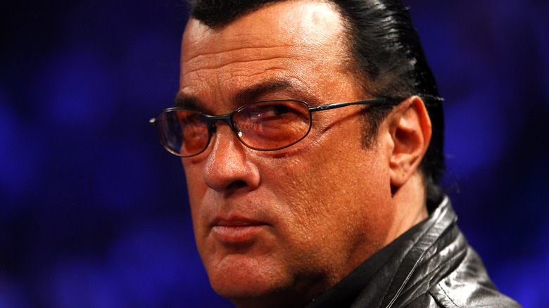 Steven Seagal attending a boxing match