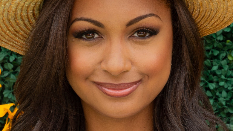 Eboni K. Williams posing at a red carpet event