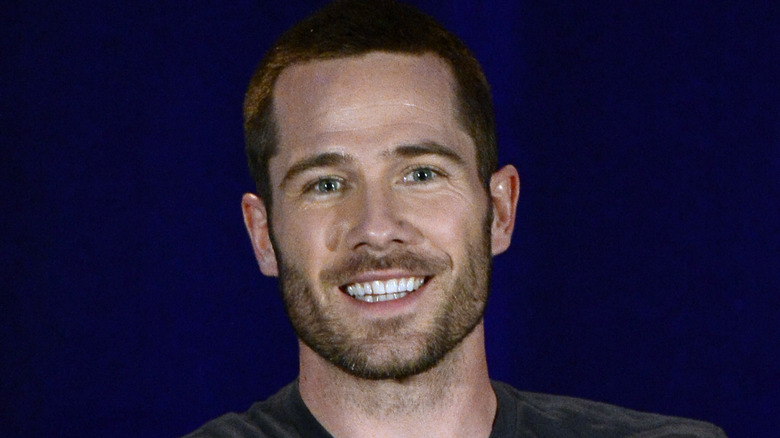 Luke McFarlane smiling