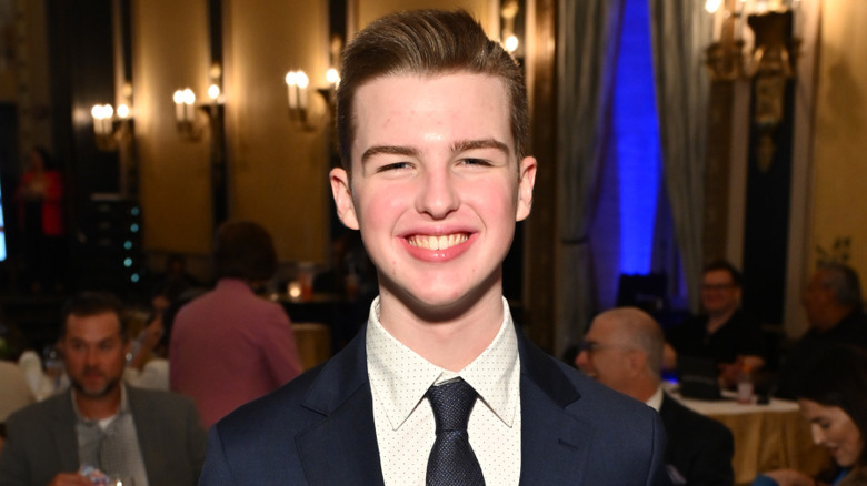 Iain Armitage smiling at an event.