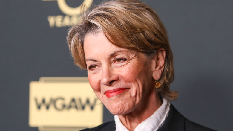 Wendie Malick posing at an event.